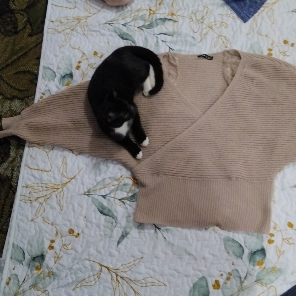 Cross over beige over the shoulder sweater
